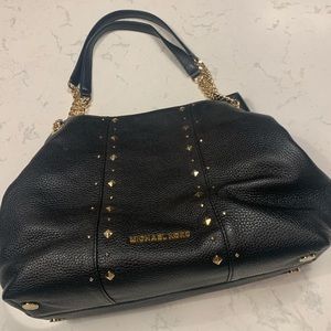 Michael Kors Black leather purse with Gold studs